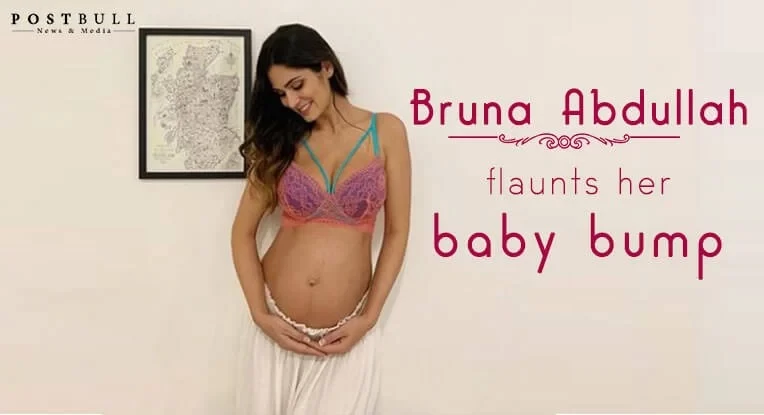 Bruna Abdullah flaunts her baby bump in a pink bralette